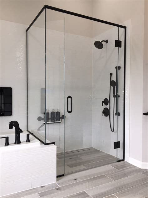 black metal framed shower enclosure|black frameless shower enclosure.